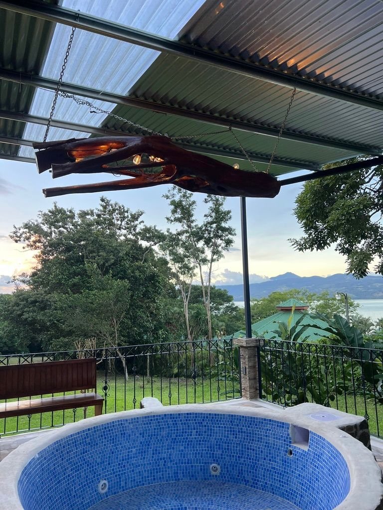 Covered private spa with mountain and lake view